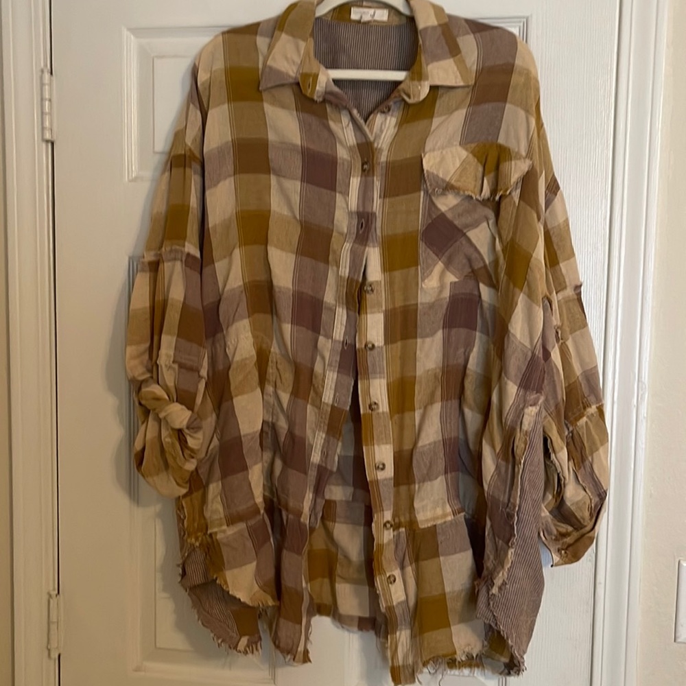 Long, baggy, fall long sleeve shirt. Button down